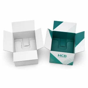 Top-down view of open corrugated boxes showing a custom-fitted interior insert for secure product placement.