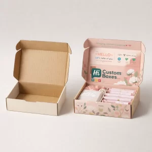 Two cardboard mailer boxes, one empty brown and one decorated with floral prints and tampons.