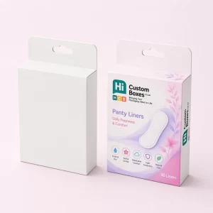 Two cardboard mailing boxes, one plain white and one featuring purple floral branding for panty liners.