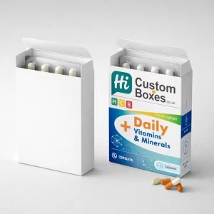 Two open white boxes showing pill blister packs inside, one plain and one with blue branding.