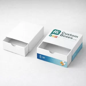 Two white slide-out drawer boxes, one minimal and one featuring blue and green product branding.