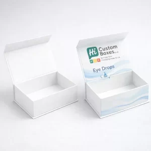 Two premium rigid boxes with lids, one minimal white and one featuring elegant blue medical illustrations.