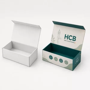 Two rigid magnetic gift boxes for yoga accessories with teal branding and custom botanical illustrations.