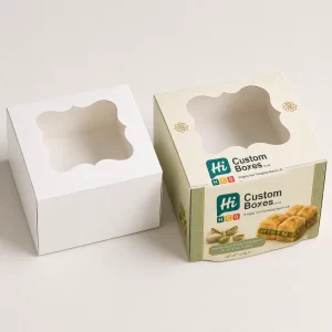 Custom paperboard baklava sweet box featuring a shaped clear display window and green side panels with pistachio baklava imagery.