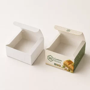 Custom baklava bakery box with a top lid opening, featuring pistachio graphics and traditional green geometric motifs.